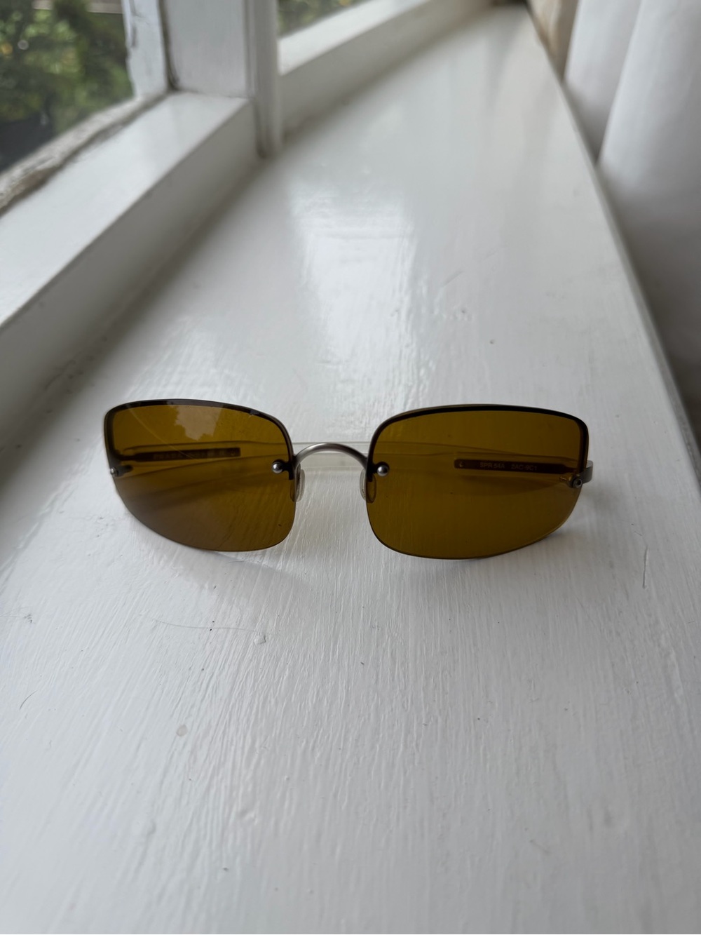 Prada Women's Rimless Rectangle Sunglasses in Amber Lenses with Thin Metal Frame - Picture 5 of 6